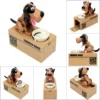 Alcancía de perros come monedas